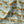 Tiger Tiger linen by Annika Reed in mint green and orange, draped close-up of tigers and trees