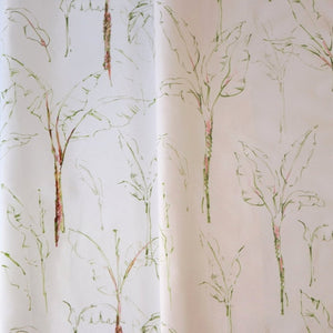 Tropical Paradise linen by Seed Home Designs in pink, in soft folds showing slender tropical stems