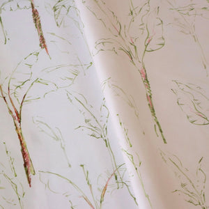 Tropical Paradise linen by Seed Home Designs in pink, draped close-up of slender tropical stems