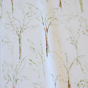 Tropical Paradise linen by Seed Home Designs in white, draped, showing slender tropical stems