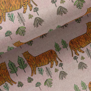 Tiger Tiger linen by Annika Reed in pink and orange, in soft folds showing tigers and trees