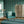 Calla Lily wallpaper by Annika Reed in green and white, calla lilies in a living room
