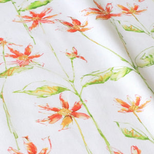 Dancing Autumn Daisies linen by Seed Home Designs in orange and green, flat sample of orange daisies on tall stems