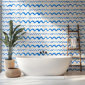 Wave After Wave wallpaper by Seed Home Designs in blue and white, wavy watercolour lines in a bathroom