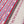 Wild linen by Bethie Tricks in pink, draped, showing block-print leaf sprigs (alternate view)