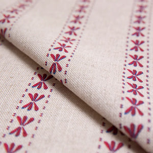 Wild linen by Bethie Tricks in pink, draped close-up of block-print leaf sprigs (alternate view)