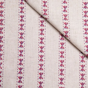 Wild linen by Bethie Tricks in pink, in soft folds showing block-print leaf sprigs