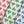 Wild linen by Bethie Tricks in green, draped, showing block-print leaf sprigs