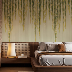 Willow wallpaper by Dami and Em Design in green and cream, trailing willow leaves in a bedroom