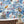 Wired wallpaper by Brand McKenzie in white, animals perched on telegraph wires on a bathroom wall