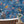 Wired wallpaper by Brand McKenzie in navy, animals perched on telegraph wires on a bathroom wall