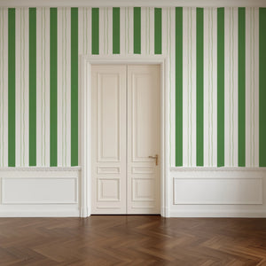 Wobble Large wallpaper by Annika Reed in green, wobbly stripes in a hallway