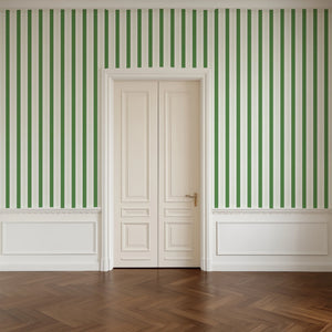 Wobble Small wallpaper by Annika Reed in green, wobbly stripes in a hallway