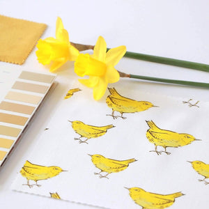Yellow Bird fabric by Seed Home Designs in yellow and white, flat sample of little yellow birds