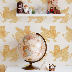 Winged Lion wallpaper by Annika Reed in mustard, winged lions in a child's room