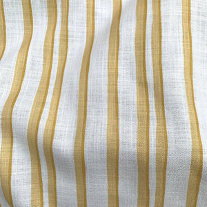 Somerset Stripes linen by Annika Reed in yellow, draped, showing painted stripes